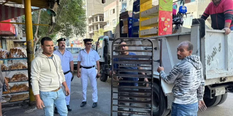 حملة إزالة واسعة للتعديات في العمرانية وإمبابة