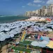 «100 %» نسبة الإشغال.. شواطئ الإسكندرية تعيش ذروة الإقبال الصيفي
