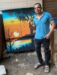 «فيها حاجة حلوة»: ريشة «حسين» تحول لوحات الشوارع إلى سعادة وفن 1 - جريدة الجمهورية «فيها حاجة حلوة»: ريشة «حسين» تحول لوحات الشوارع إلى سعادة وفن