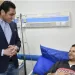 وزير الشباب والرياضة يزور عاملًا بنادي «النادي» في المستشفى ويؤكد: الجميع سواسية في خدمة الوطن